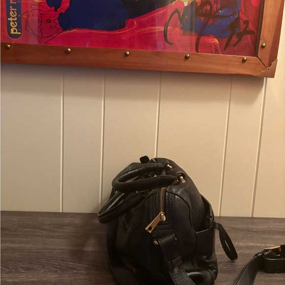 Black Shoulder Bag with Silver Hardware and Structured Design - Picture 3 of 6